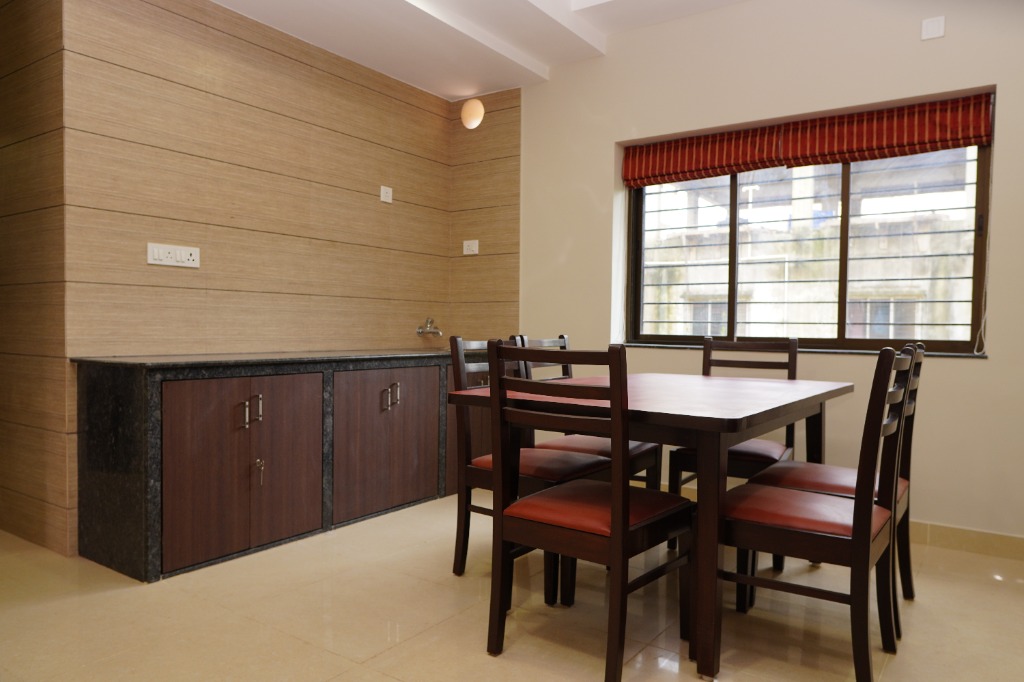 Dining area and wooden cabinets